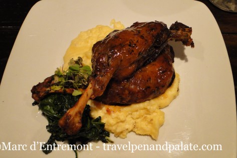 roast duck at Carley's glazed with a not overly sweet orange plum sauce and topping wilted spinach and goat cheese infused polenta. 