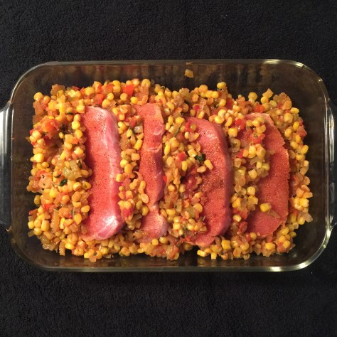 arrange in baking dish overlapping pork and Maque Choux, cover with foil and bake according to directions